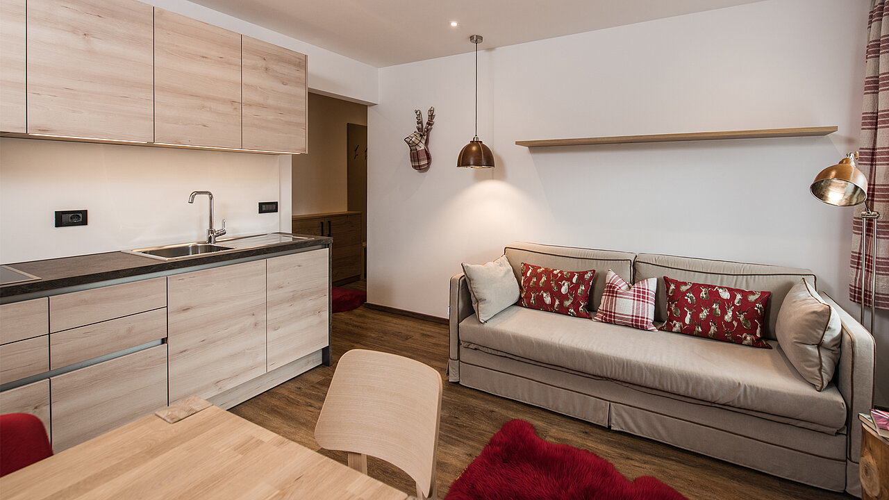 Wohnbereich und Küche des Apartments Sella