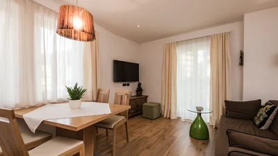 Living area and kitchen of the apartment Resciesa in Ortisei