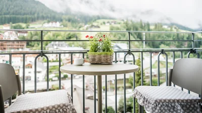 View from the balcony of the living area of apartment Saslonch in Ortisei towards Alpe di Siusi